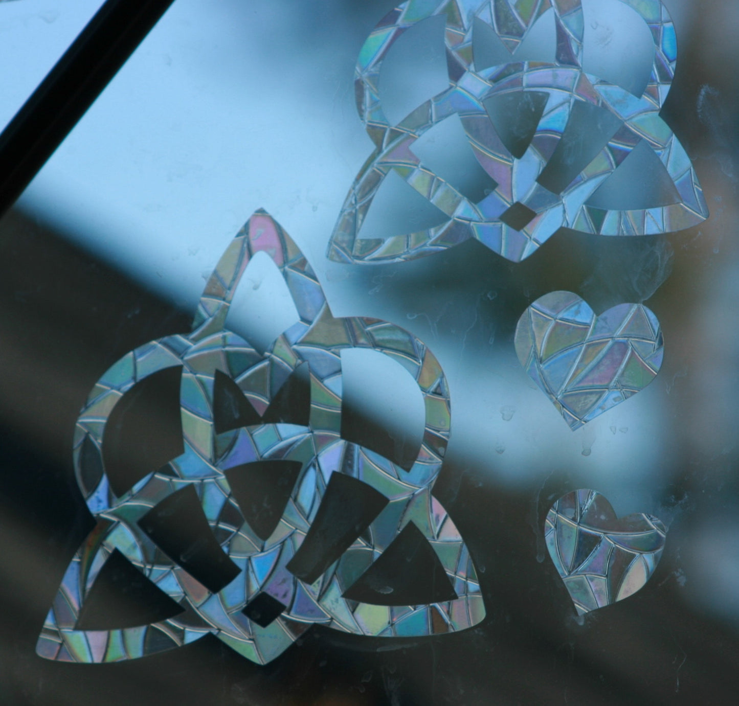 Celtic Knot with Heart. Two size options. Charmed Triquetra Window Clings. Sun Catcher. Rainbow Prism Decoration. Static Window Cling.